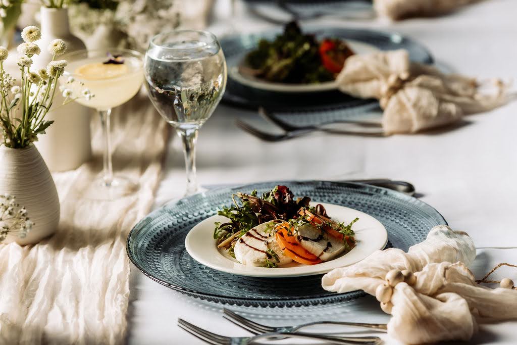 Dinner plate with glass of wine